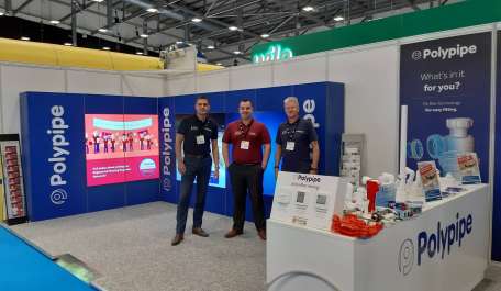 Three of Polypipe's Area Heating Managers stood on the Polypipe Stand at Installer 2019.