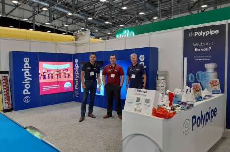 Three of Polypipe's Area Heating Managers stood on the Polypipe Stand at Installer 2019.